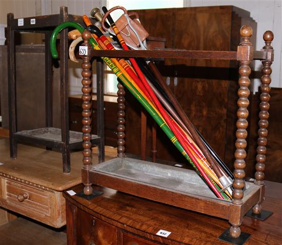 2 stick stands and a selection of canes